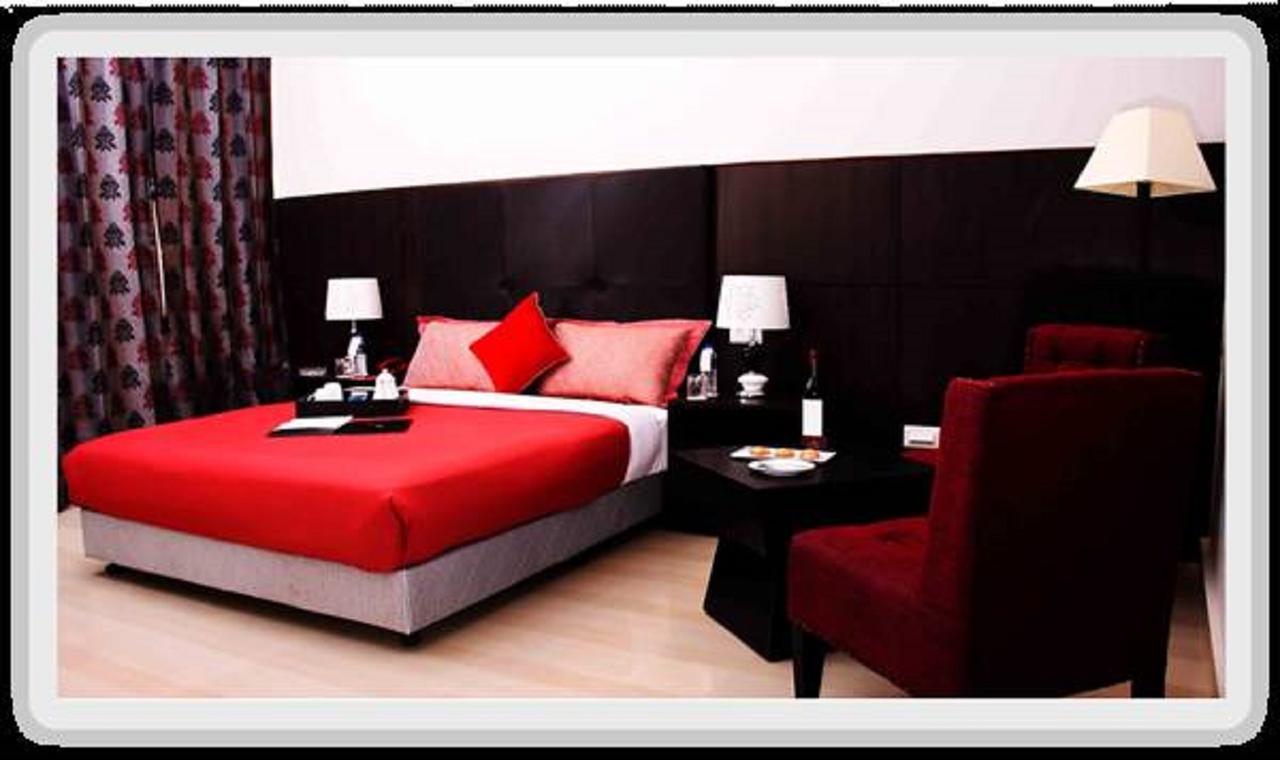 Отель De Oriental Grand Kohima Номер фото